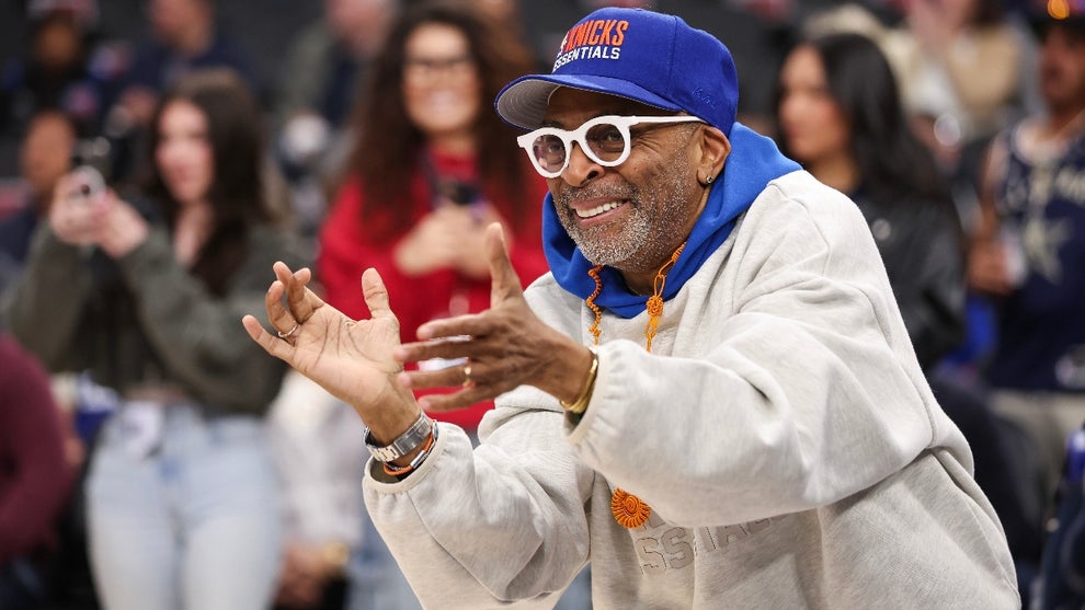 Spike Lee cheers from the sideline ahead of the game between the LA Clippers and the New York Knicks at Intuit Dome on March 07, 2025 in Inglewood, California