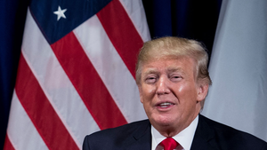 President Donald Trump laughing (Credit: Getty Images)