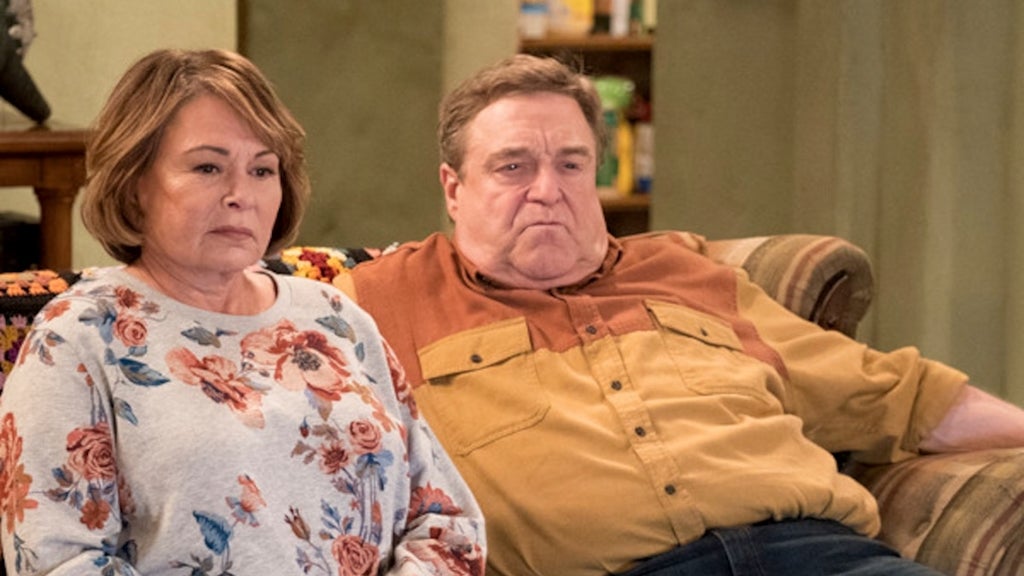 Roseanne and John Goodman on "Roseanne"