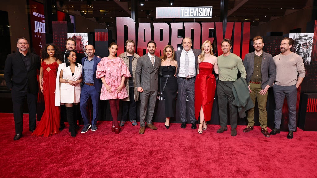 The cast of Daredevil: Born Again stands on the red carpet at the series premiere in New York