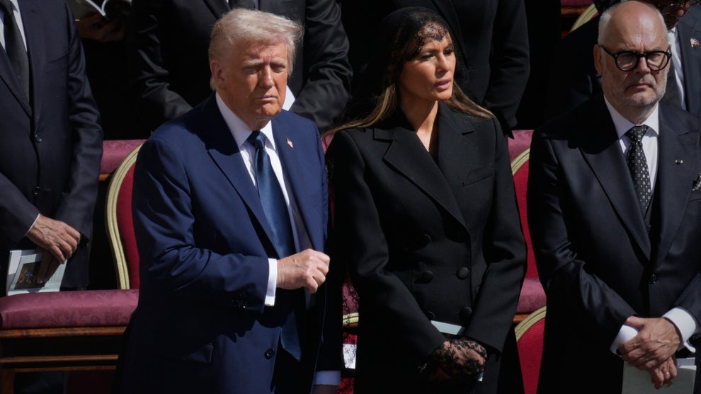 US President Donald Trump and Melania Trump are seen at the funeral of Pope Francis in Rome, Italy on 26 April, 2025. Turmp has been criticized for wearing a blue suit in stead of the customary black to the funeral of the late Pope
