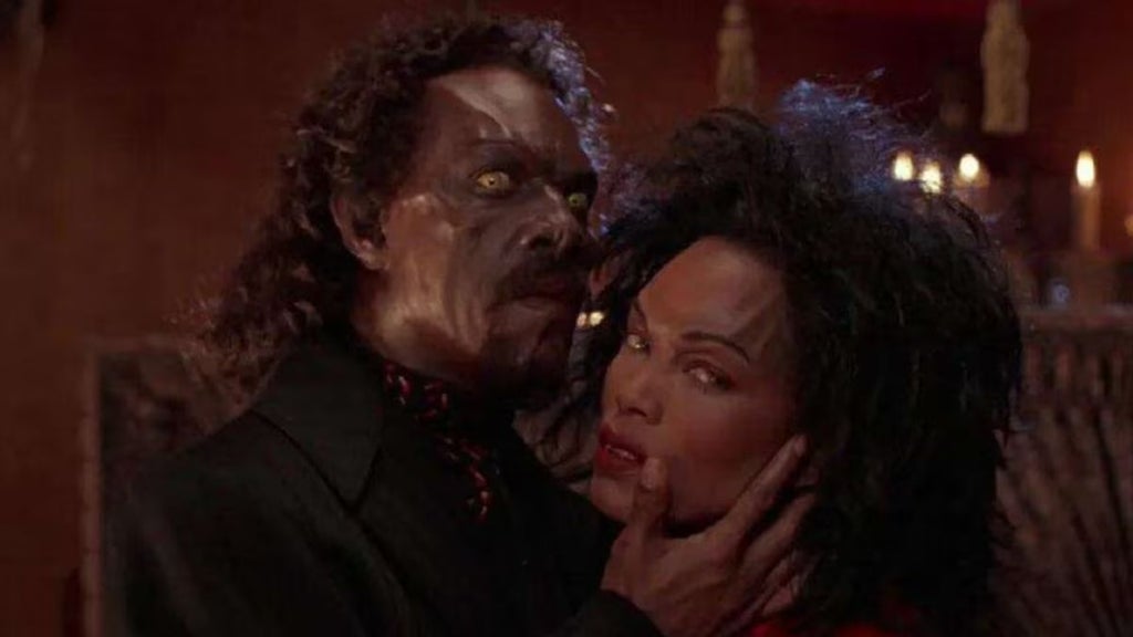 Eddie Murphy and Angela Bassett as Maximillian and Det. Rita Veder in "Vampire in Brooklyn" (Paramount Pictures)