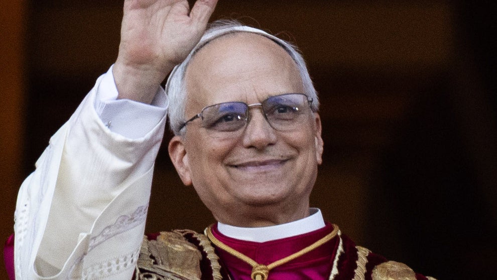 Newly elected Pope Leo XIV (l), the American Robert Prevost, appears on the balcony of St. Peter's Basilica in the Vatican (Credit: Oliver Weiken via Getty Images)