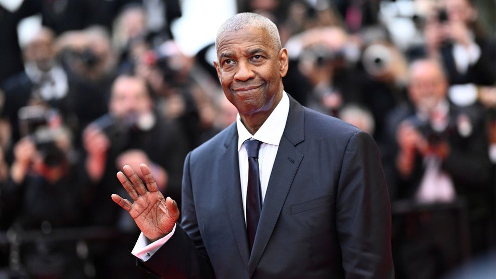 Denzel Washington attends the "Highest 2 Lowest" red carpet at the 78th annual Cannes Film Festival at Palais des Festivals on May 19, 2025 in Cannes, France. (Credit: Gareth Cattermole/Getty Images)
