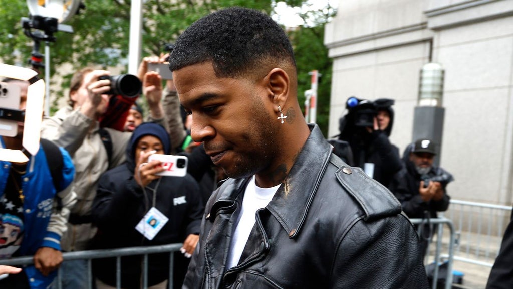 NEW YORK, NEW YORK - MAY 22: Kid Cudi departs the Manhattan Federal Court during the Sean "Diddy" Combs' trial on May 22, 2025 in New York City. Combs, 55, has pleaded not guilty on all counts, which include a racketeering charge alleging the hip-hop pioneer was the leader of a sex crime ring that included drug-fueled sex parties through the use of force, threats and violence (Photo by John Lamparski/Getty Images)