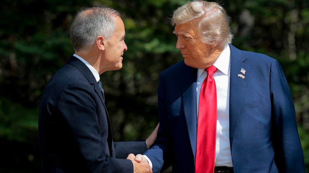 Canadian Prime Minister Mark Carney greets President Donald Trump at the official welcome ceremony during the G7 Leaders' Summit. (Credit: Chip Somodevilla/Getty Images)