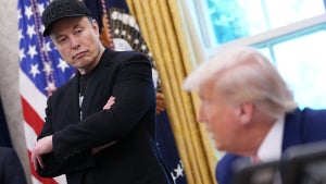 Elon Musk listens as U.S. President Donald Trump speaks to reporters in the Oval Office of the White House on May 30, 2025 in Washington, DC. (Kevin Dietsch/Getty Images)