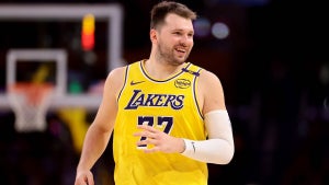 The Lakers, just sold in a record-setting deal, acquired star Luka Doncic via a midseason trade (Photo by Katelyn Mulcahy/Getty Images)