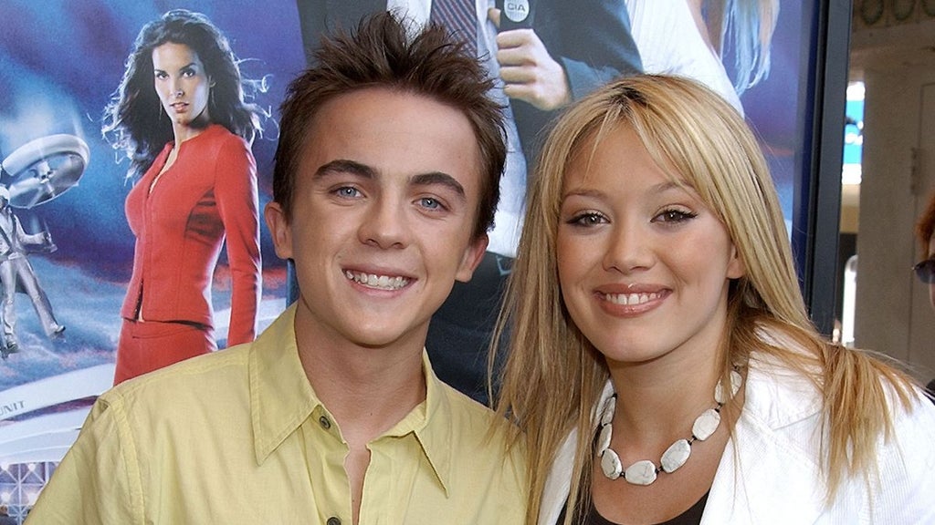 Frankie Muniz and Hilary Duff during The World Premiere of MGM's "Agent Cody Banks" - Arrivals / Party at Mann's Village Theatre in Westwood, California, United States. (Photo by Gregg DeGuire/WireImage)