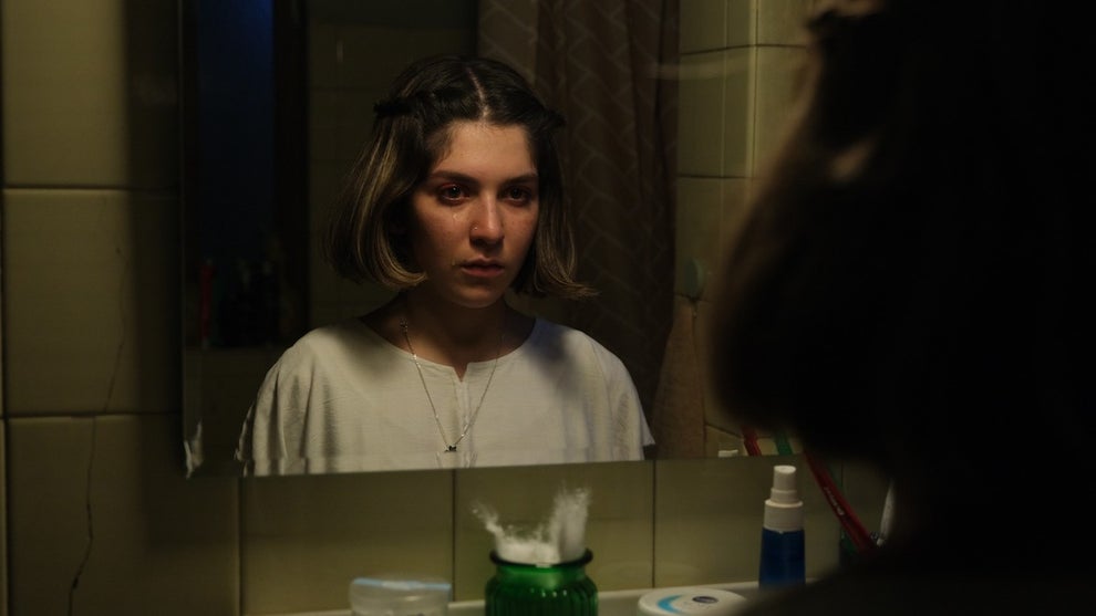 Sarvin Zabetian as Seti looking into a mirror in a still from Bidad.