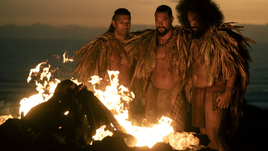 Te Kohe Tuhaka, Jason Momoa and Siua Ikale‘o in "Chief of War" (Apple TV+)