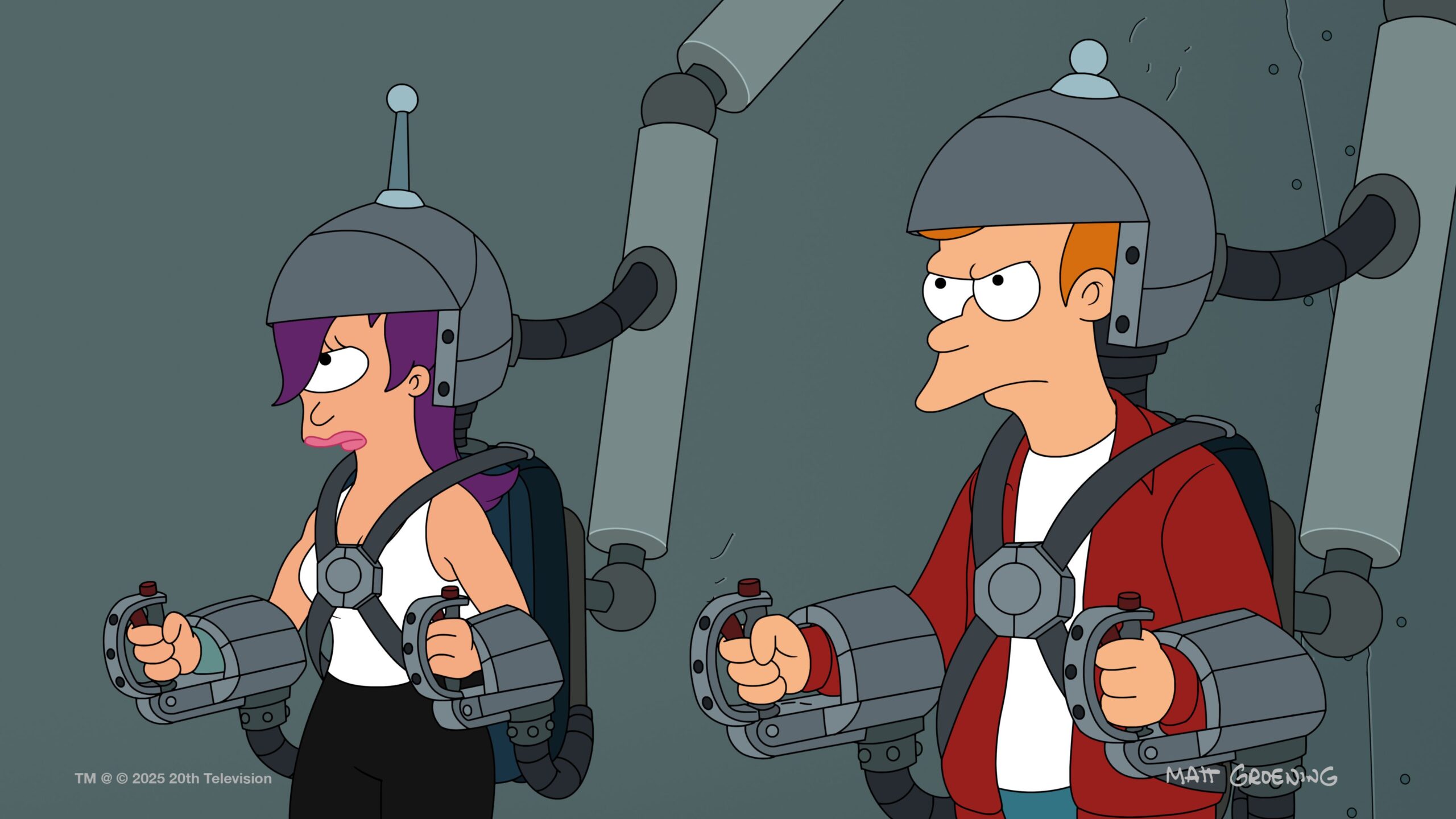 Fry and Leela sit hooked up to machines while holding controllers in each hand