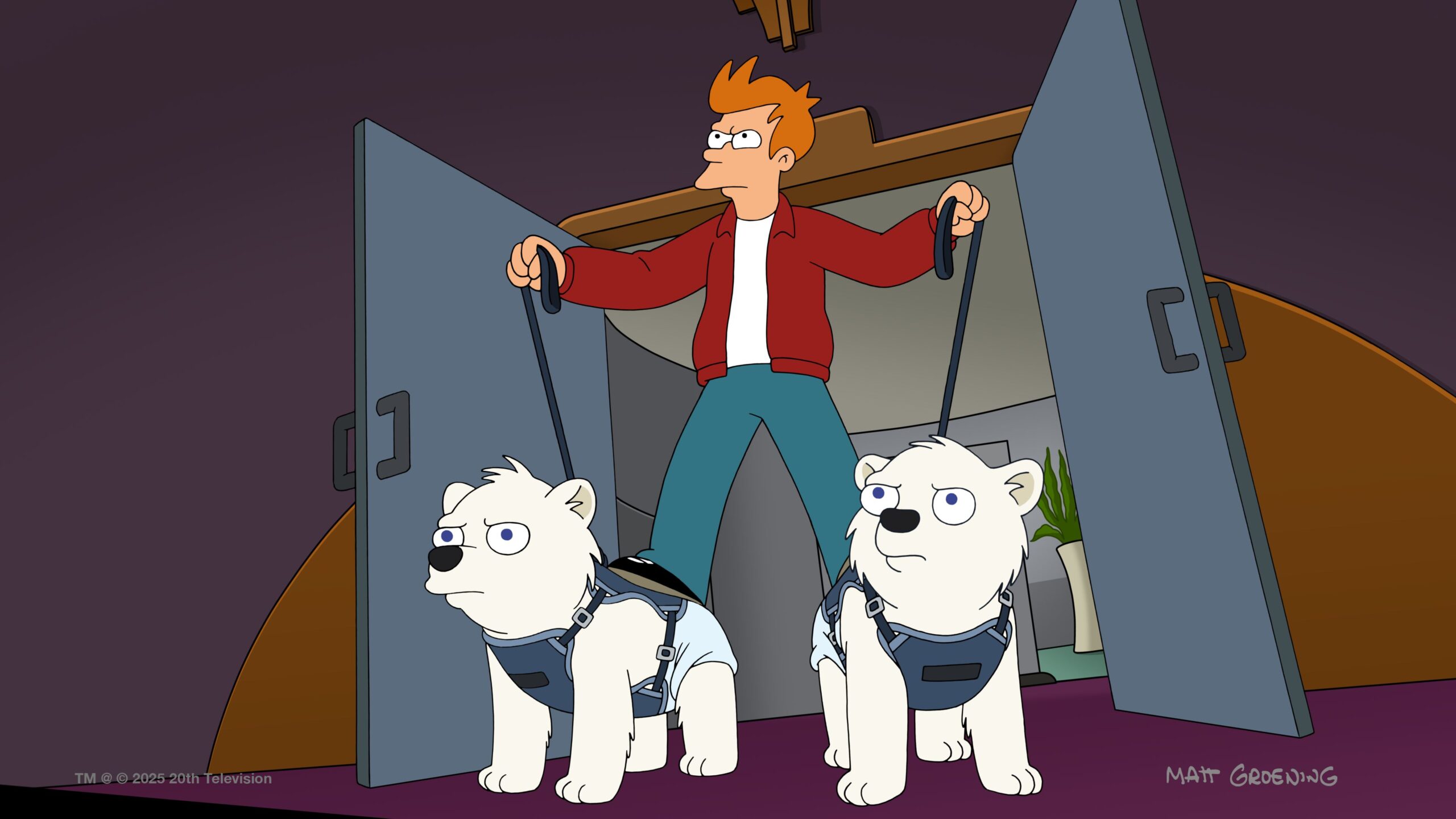 Fry stands in a doorway while standing on two baby polar bears and holding their leashes