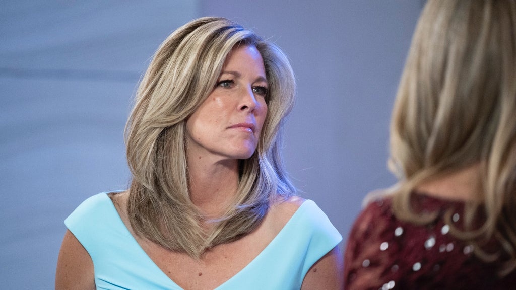 Laura Wright wears a light blue dress in "General Hospital"