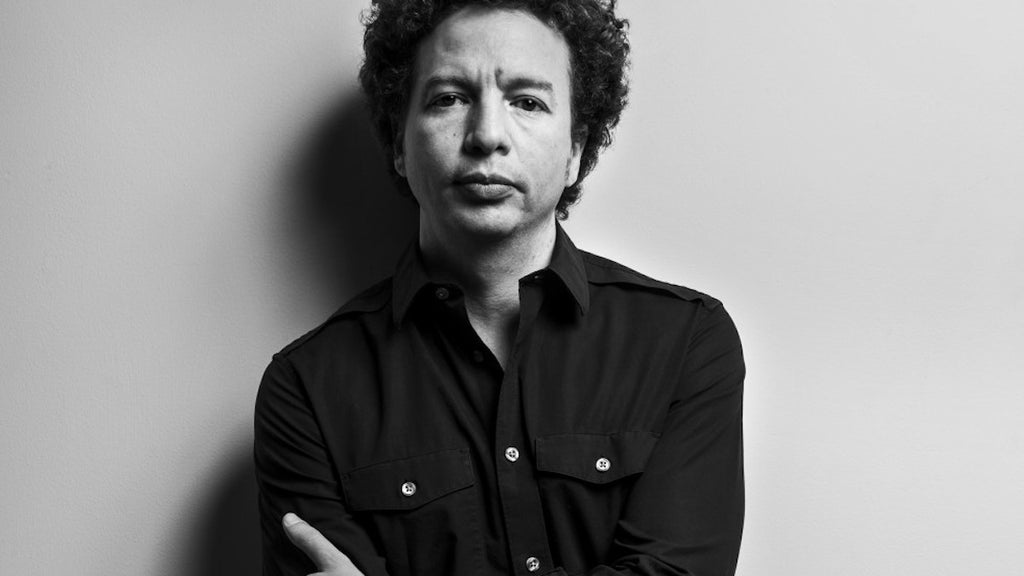 A photo of filmmaker Michel Franco standing with his arms crossed. 