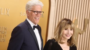 Ted Danson (left) Mary Steenburgen (right) pose in front of a golden background for the SAG Awards