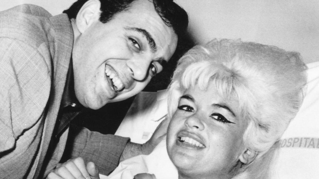 Jayne Mansfield shares a happy moment with her husband, Matt Cimber, shortly after the birth of her fifth child. (Photo by Bettmann Archive/Getty Images)