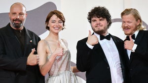 Yorgos Lanthimos, Emma Stone, Aidan Delbis and Jesse Plemons attend the "Bugonia" world premiere at the Venice International Film Festival. (Credit: Getty Images)