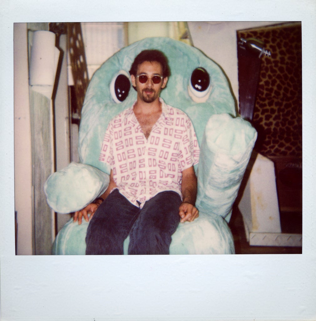Paul Reubens sits in Chairy from Pee-wee's Playhouse