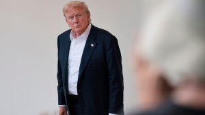 U.S. President Donald Trump speaks to reporters near the Rose Garden after returning to the White House on Marine One on July 29, 2025 in Washington, DC.
