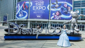 NAHEIM, CALIFORNIA - SEPTEMBER 11: Disney cosplayer Emily Newton as Cinderella poses outside Disney's D23 Convention on September 11, 2022 in Anaheim, California. (Photo by Daniel Knighton/Getty Images)