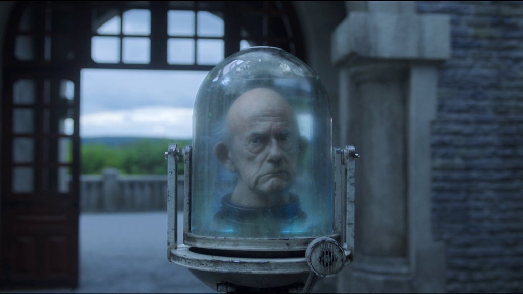 Christopher Lloyd plays Professor Orloff in Wednesday, an old Nevermore teacher who is a disembodied head in a tank