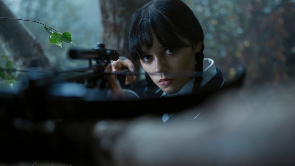 Jenna Ortega wields a crossbow in "Wednesday" Season 2