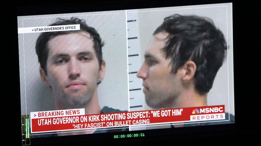 A TV monitor displays a picture of Tyler Robinson, the suspected of killing Charlie Kirk on September 11, in Orem, Utah, on September 12, 2025