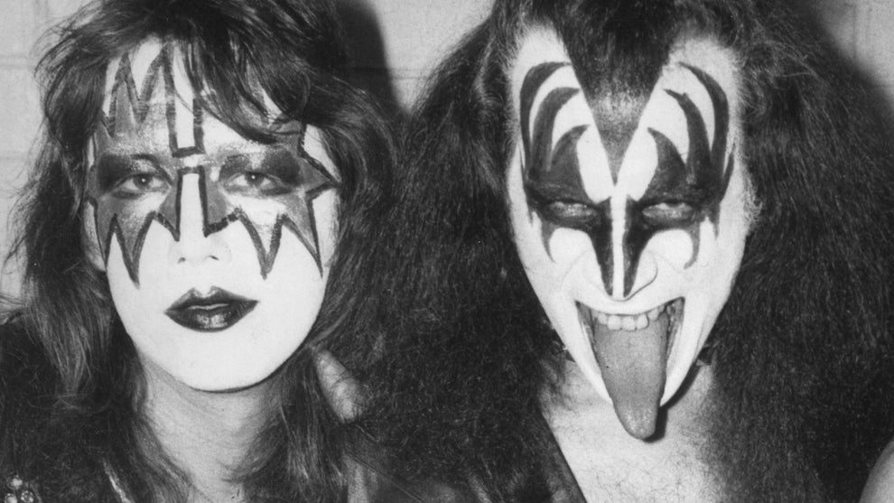 Ace Frehley and Gene Simmons arrive at London airport for Kiss' first European tour in May 1976. (Peter Cade/Central Press/Getty Images)