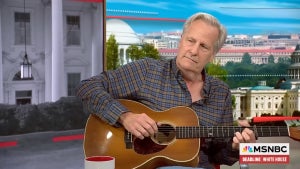 Jeff Daniels plays acoustic guitar on MSNBC
