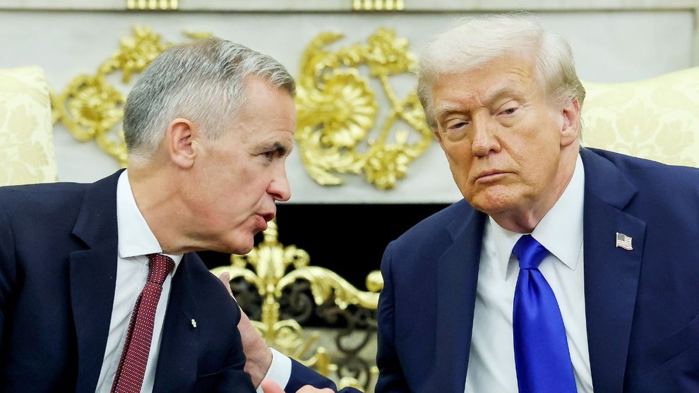 U.S. President Donald Trump (R) and Canadian Prime Minister Mark Carney speak to reporters in the Oval Office of the White House on October 07, 2025 in Washington, DC. (Credit: Anna Moneymaker/Getty Images)
