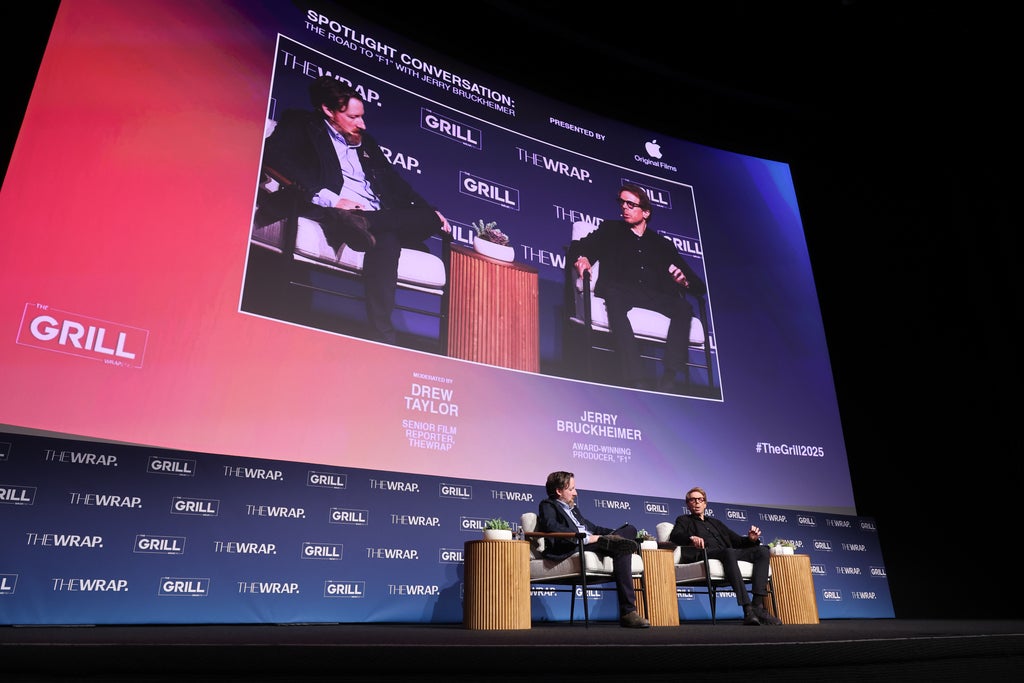 Drew Taylor, Senior Film Reporter, TheWrap and Jerry Bruckheimer, Award-Winning Producer "F1" speaks onstage  at TheGrill 2025 during the Spotlight Conversation: The Road to “F1” with Jerry Bruckheimer 