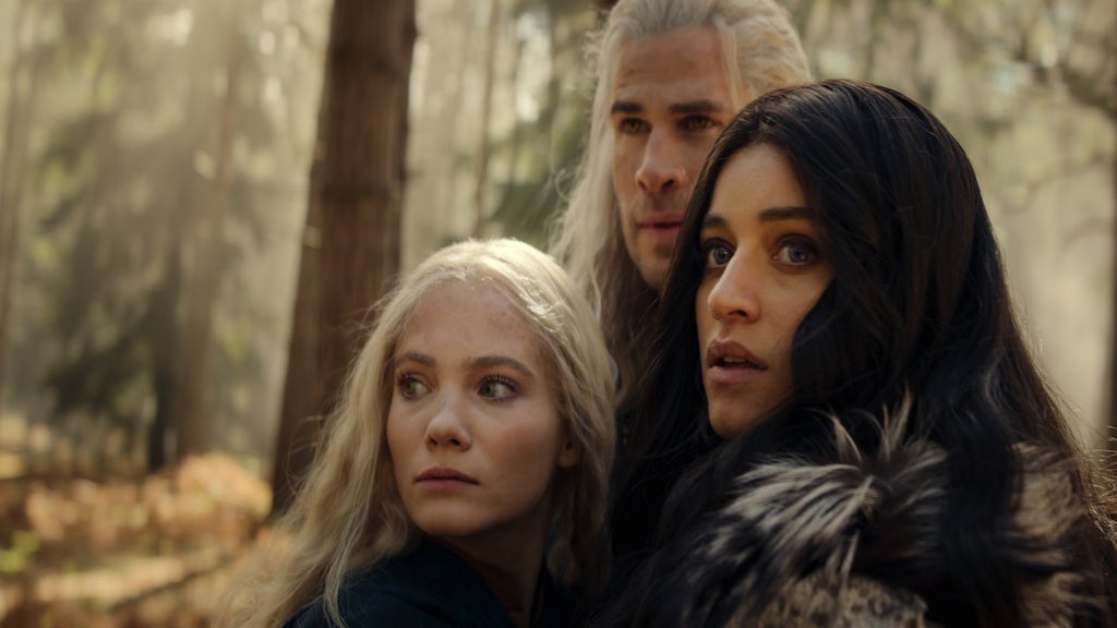 Freya Allan
as Ciri, Liam Hemsworth as Geralt, and Anya Chalotra as
Yennefer in "The Witcher" (Credit: Netflix)