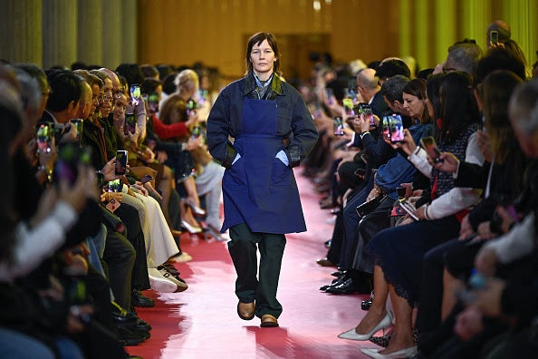 German actress Sandra Hüller presents a creation by Miu Miu for the Spring/Summer 2026 collection. Source: Getty