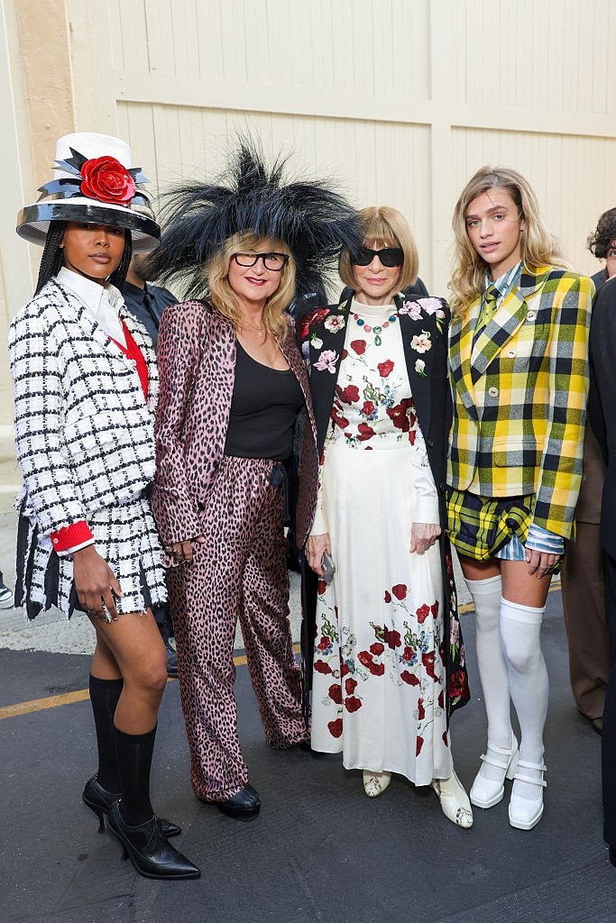 Left to right, a model wears Thom Browne, costume designer Mona May, Condé Nast Chief Content Director Anna Wintour and a Mona May-designed costume from Clueless. Source: Getty