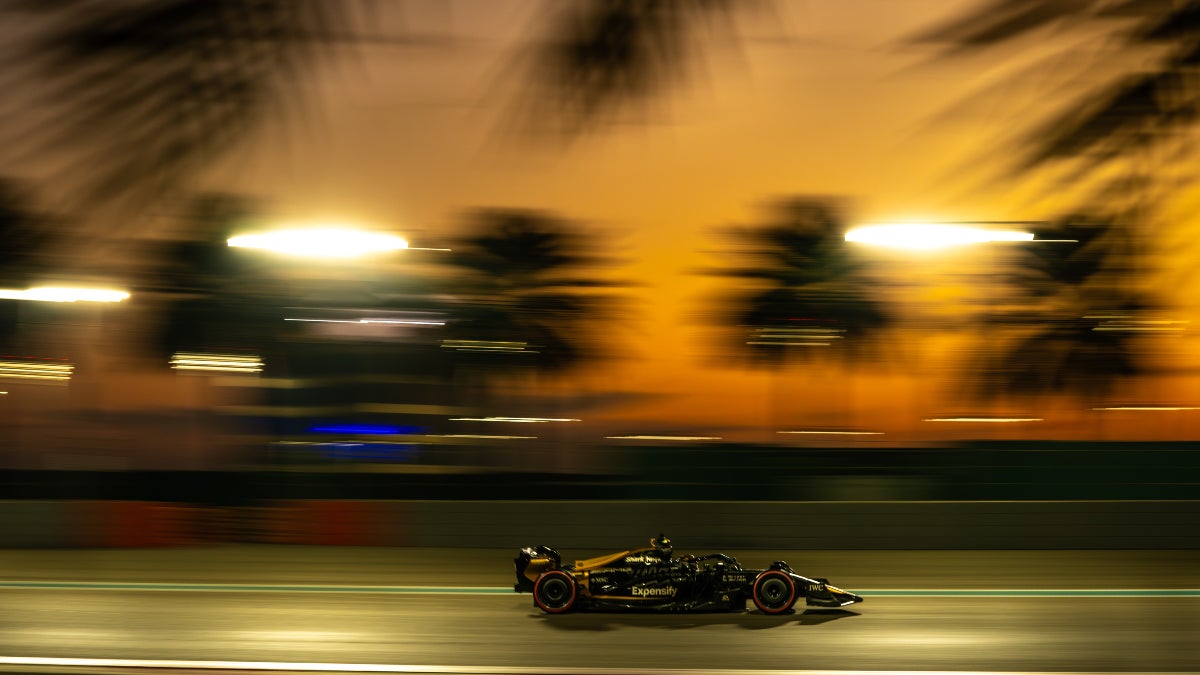 A Formula One car races at sunset in "F1: The Movie"