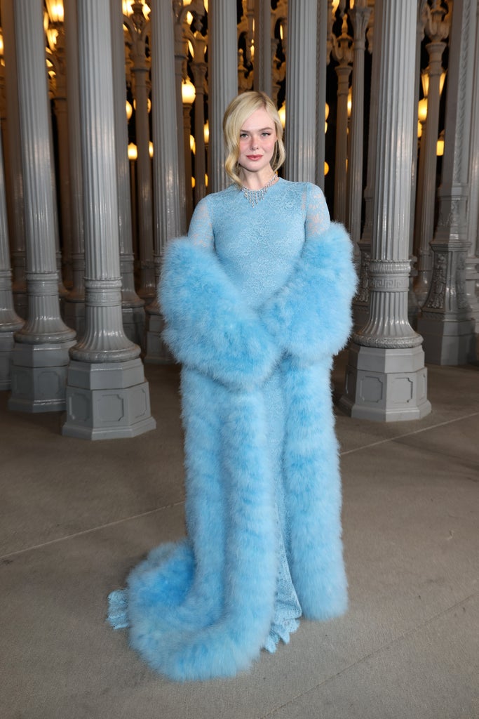 Elle Fanning, wearing Gucci