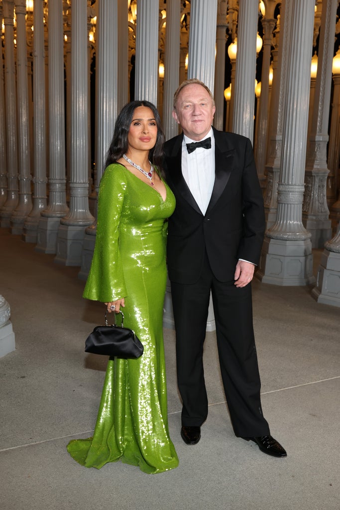 Salma Hayek, wearing Gucci, and François-Henri Pinault