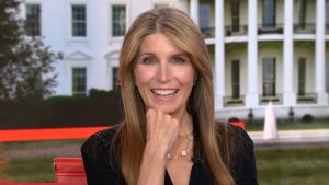 Nicolle Wallace smiles into the camera in front of a White House backdrop on MSNBC