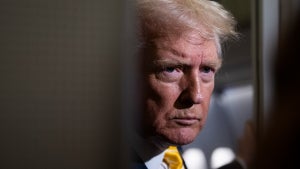 U.S. President Donald Trump speaks to members of press aboard Air Force One on November 14, 2025. (Credit: Roberto Schmidt/Getty Images)