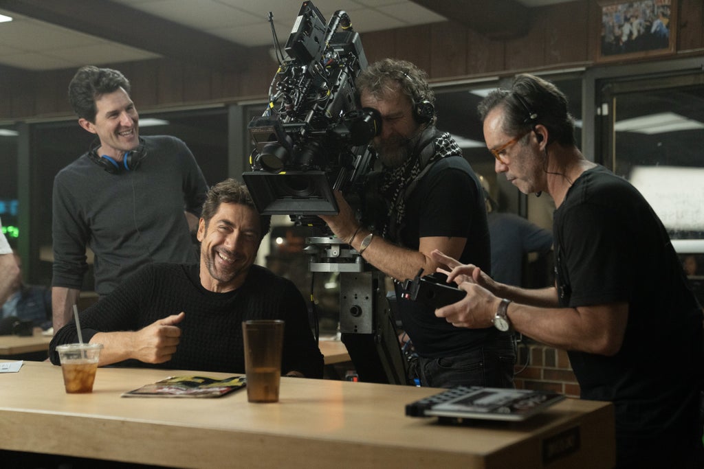 Joseph Kosinski and Javier Bardem film a scene at a bar for "F1"