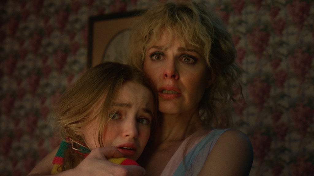 Nell Fisher as Holly Wheeler and Cara Buono as Karen Wheeler in "Stranger Things" Season 5