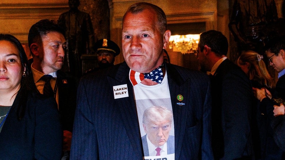 Rep. Troy Nehls is walking to the House Chamber wearing a Donald Trump shirt and a Laken Riley pin ahead of the President's State of the Union address in the Capitol Building, in Washington D.C., on March 7, 2024