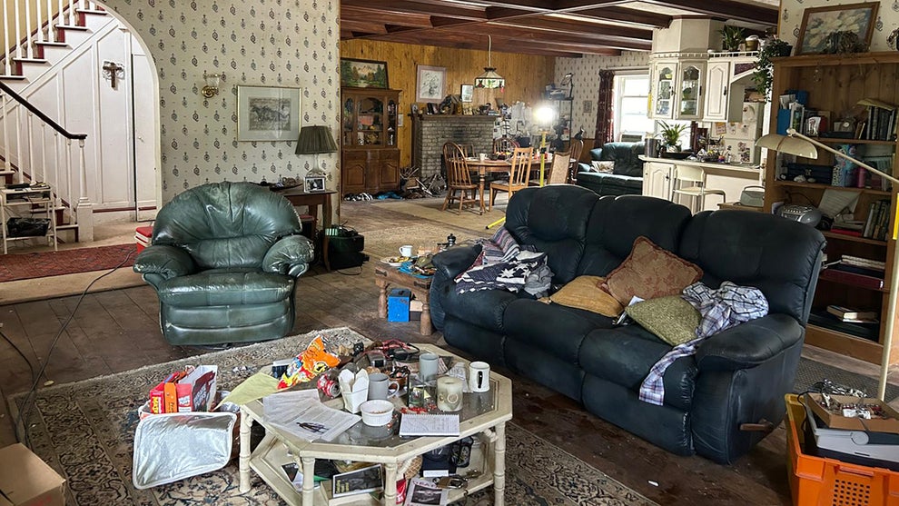A messy living room from the film "Bugonia"