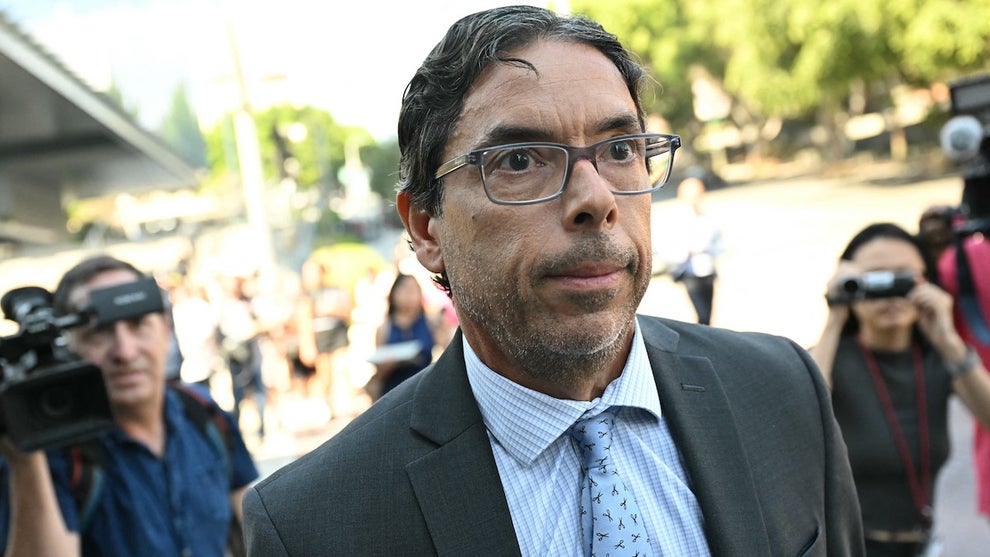 California physician Mark Chavez exits federal court in Los Angeles on Oct. 2, 2024. (Patrick T. Fallon / AFP via Getty Images)
