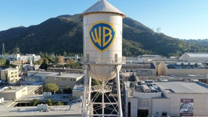 Warner Bros. logo displayed on the water tower at Warner Bros. (Credit: Mario Tama/Getty Images)