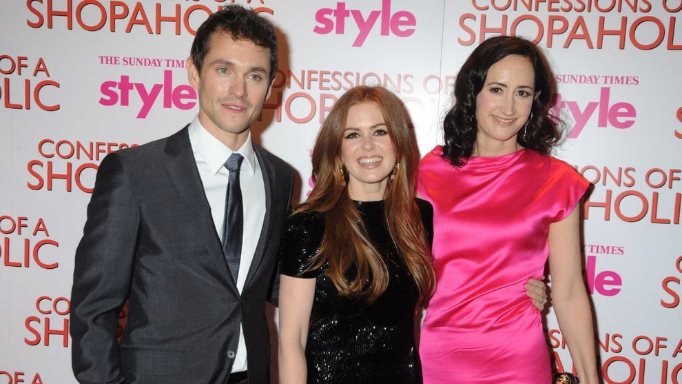 Hugh Dancy, Isla Fisher and Sophie Kinsella arrive at the UK film premiere of "Confessions Of A Shopaholic" at the Empire Cinema on February 16, 2009 in London, England. (Credit: Dave M. Benett/Getty Images)