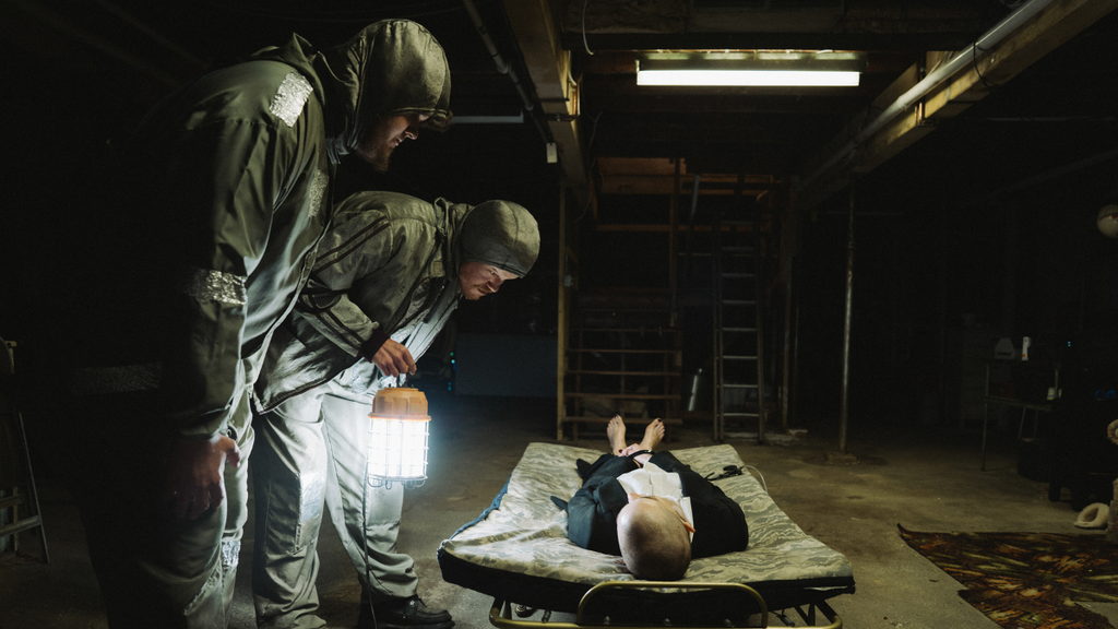 Jesse Plemons, Aidan Delbis and Emma Stone on the set of "Bugonia" (Focus Features)