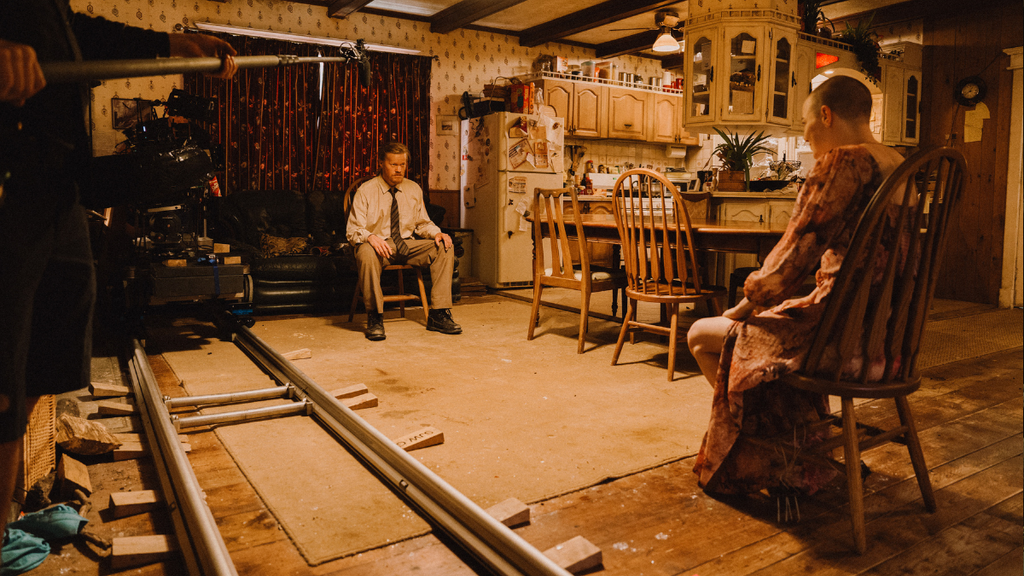 Jesse Plemons and Emma Stone on the set of "Bugonia" (Focus Features)