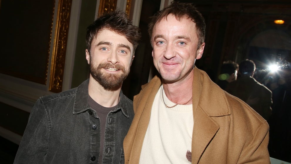 Daniel Radcliffe and Tom Felton pose during the NYC screening for the film "Merrily We Roll Along," based on the Broadway musical by Stephen Sondheim, at The Hudson Theatre on December 1, 2025 in New York City